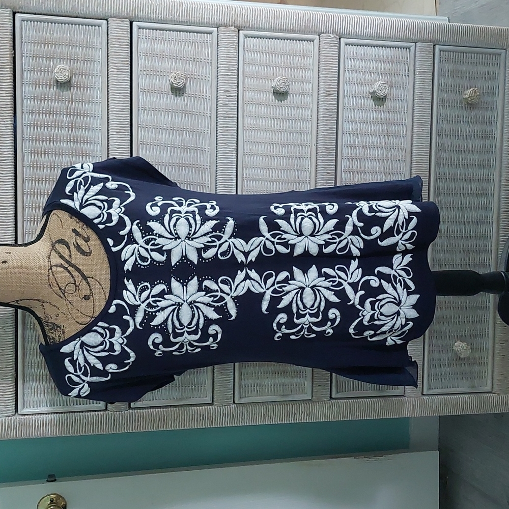 B.L.E.U. navy blue top with white embroidery